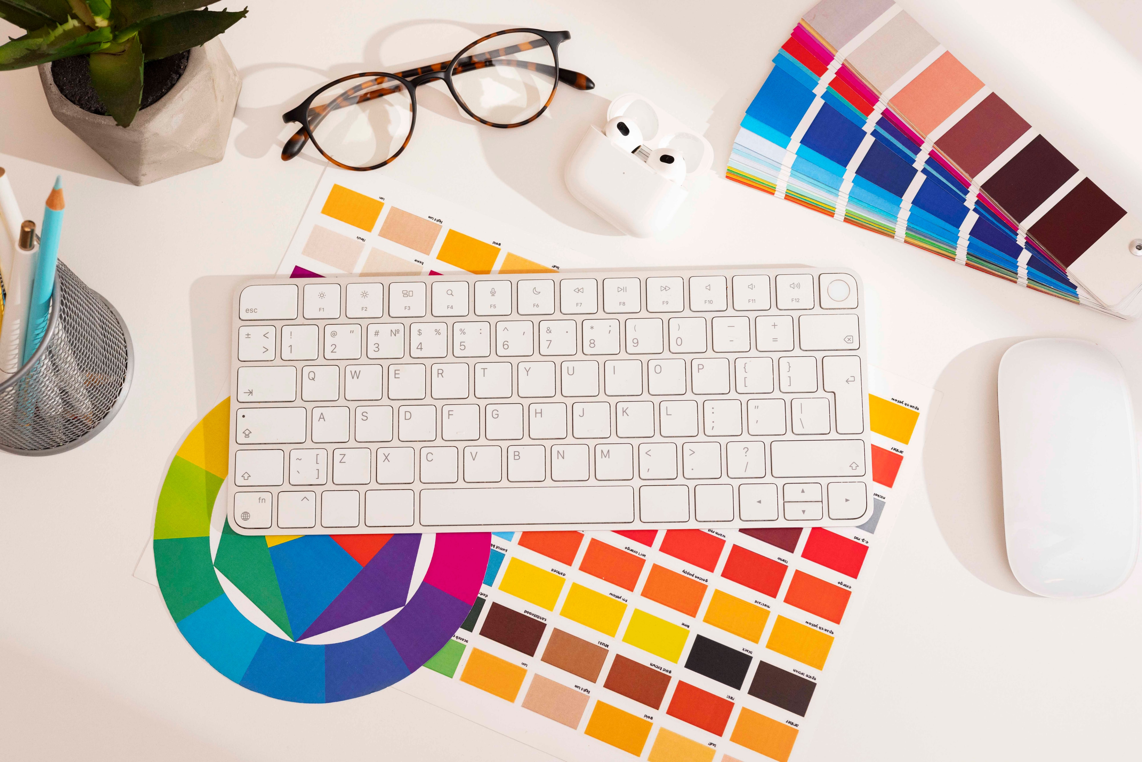 Graphic design studio still life with colour swatches